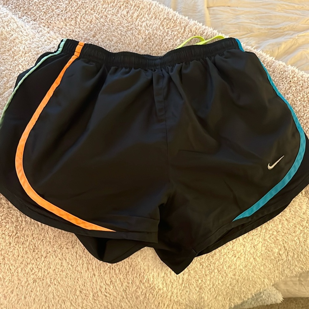 Black Nike running shorts